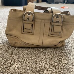 Tan Coach hand bag